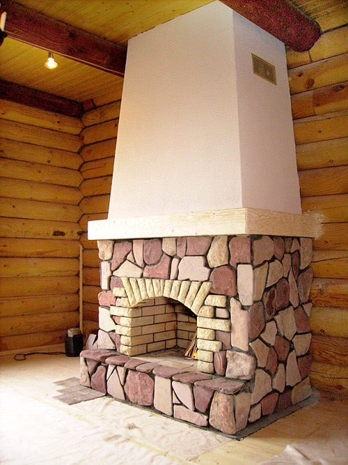 Отделка банной печи камнем
