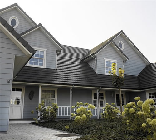 Фасад, облицованный фиброцементным сайдингом